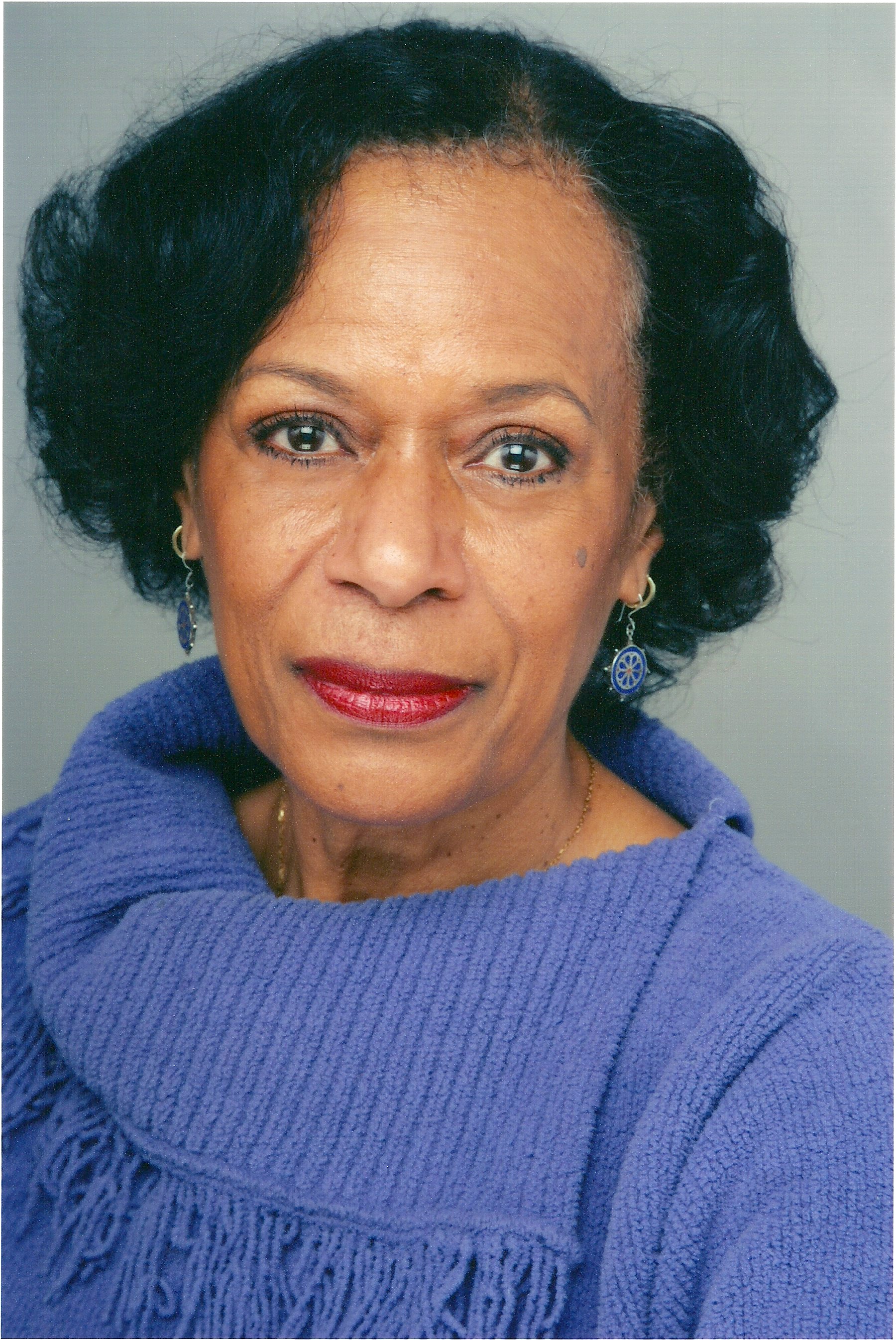 gus solomons jr headshot